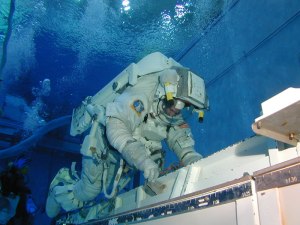 An astronaut training in the Neutral Buoyancy Lab.  Image courtesy NASA.